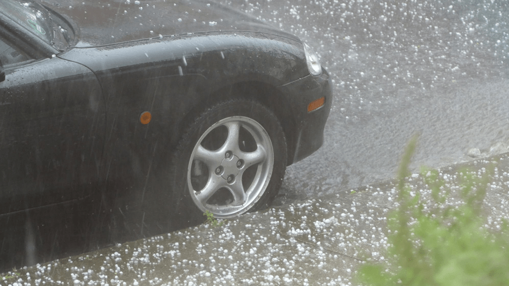 A massive hail storm slammed into concert attendees, causing injuries to nearly 100 people.