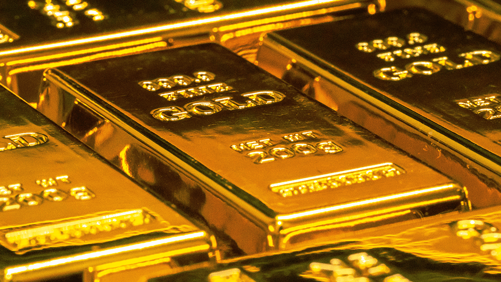 Gold decreases due to an increase in dollar yields following positive employment statistics.